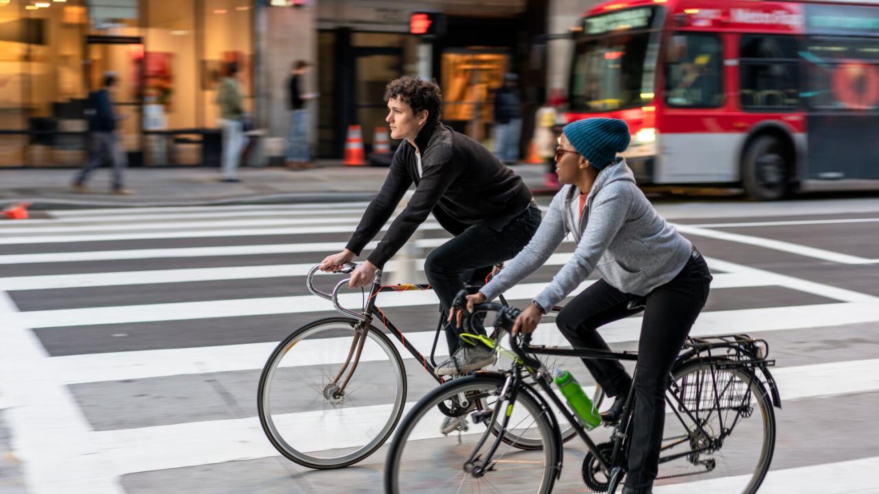 2 people on bikes
